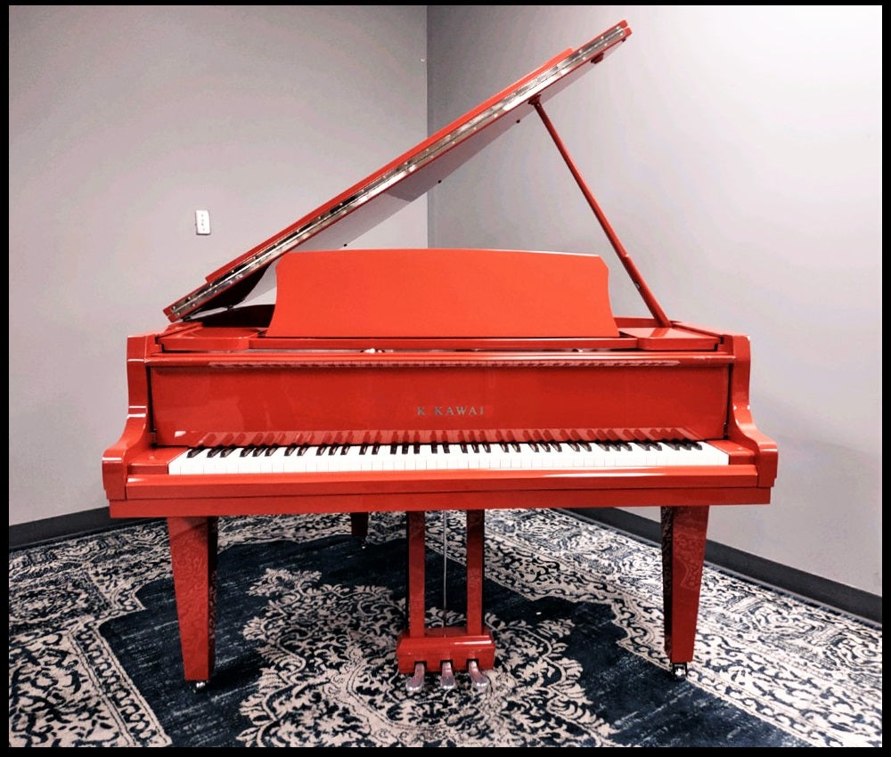 red baby grand piano