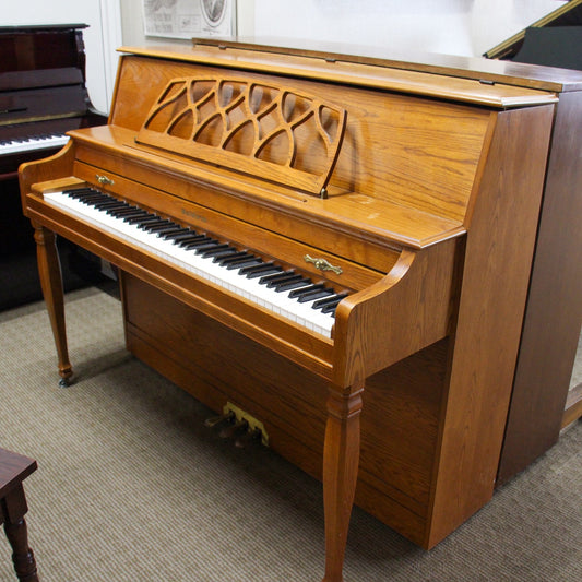 Baldwin 665 Oak Upright Console Piano